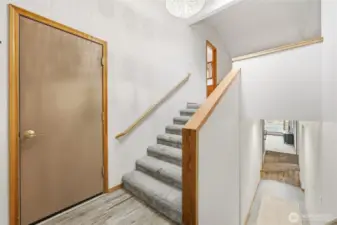 walk into this spacious split level entry way, with easy garage access to the left.