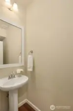 Half bath with pedestal sink.