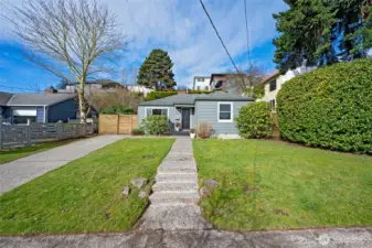 Large front yard and a long driveway! Freshly painted exterior.