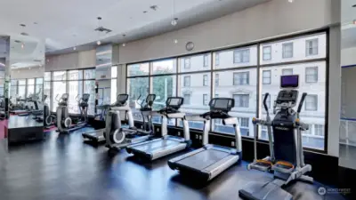 No need for a gym membership! This building offers an expansive fitness/yoga room.