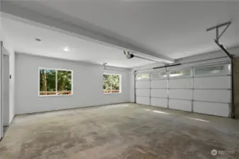 Oversized 2 car garage complete with windows and additional closet space