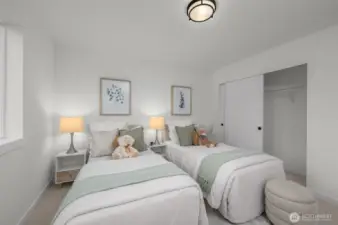 Twin beds double the charm! This beautifully staged room is ready for sweet dreams, playtime, or a cozy movie night.