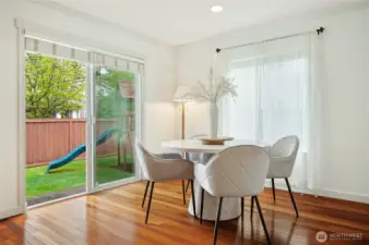 Sunny eating nook with a slider to the patio and backyard.
