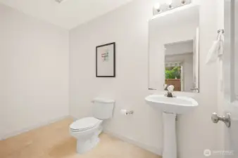 Oversized main floor half bath.