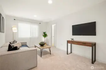 Upper level loft could flex as a media room, exercise room, or playroom.