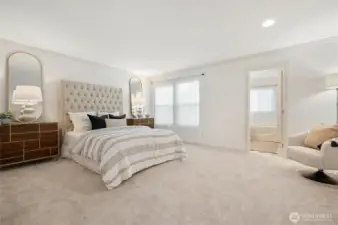 Primary bedrooms features a private bath and a large walk-in closet.