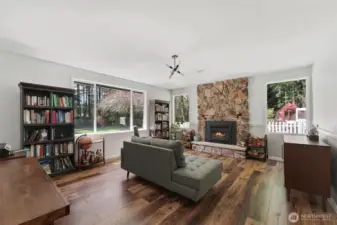 Living room with new high efficiency fireplace insert.