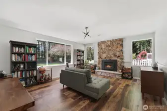 Living room with new high efficiency fireplace insert.