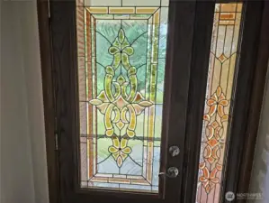 Classic features include leaded glass front door