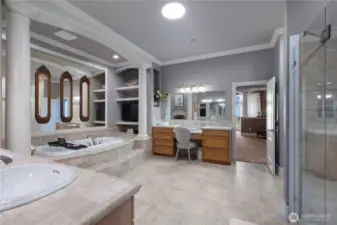 5 piece en suite featuring a jetted tub, gas fireplace and a generous walk-in wardrobe.