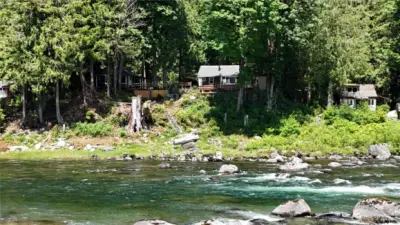WATERFRONT CABIN ALONG THE EXCEEDINGLY BEAUTIFUL SKYKOMISH RIVER.