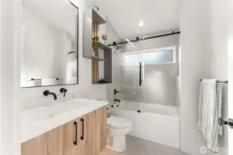 Upstairs full bathroom serving bedrooms 2 & 3.