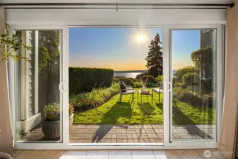 Unique private walk out to the grassy lawn all with the lake playing backdrop.