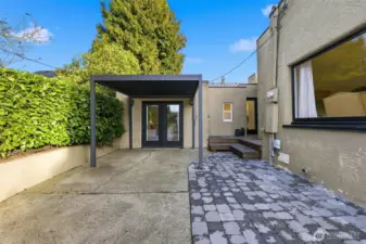 The driveway connects to your patio and a newly built deck.