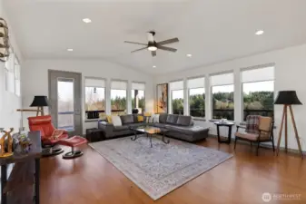 Living room with door to the porch looks over the 13th hole.