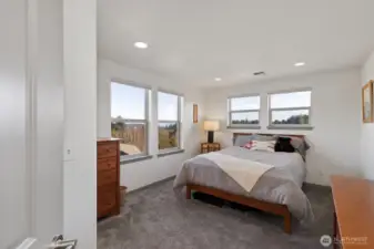 Guest bedroom faces the Olympic mountains.
