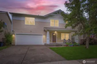Front of home with large driveway