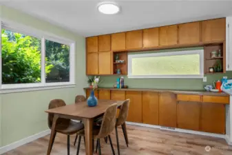 Open dining area adjacent to the kitchen, perfect for gatherings.