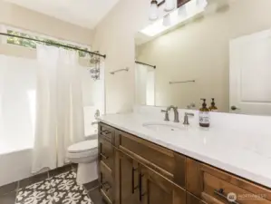 Full Bathroom with Tub/Shower Combo, Quartz Counter and Ceramic Tile Floors