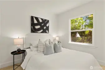 Second bedroom with large window-perfect for guests or a quiet home office