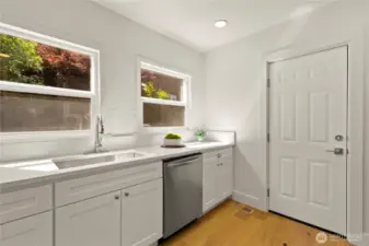 Door off kitchen leads to laundry room