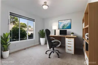 French doors lead to the main floor office conveniently located off the entry.