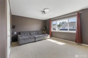 Enjoy movie nights or game days in the dedicated media room, complete with a screen and equipment ready to go. Located on the second floor, this versatile space also features a large closet—perfect for storing games, gear, or extra tech.