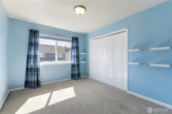 The third bedroom features a large closet and is located close to the main bathroom.