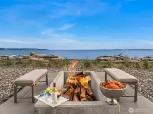 Enjoy your fresh catch of the day beside a large firepit, thoughtfully designed for cooking and entertaining large gatherings.