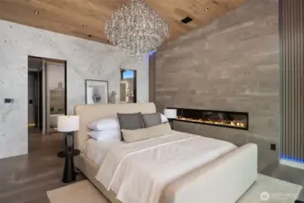 Welcome to where you can say your dreams have come true. Look at the wall of book matched marble behind the bed. Wowza!