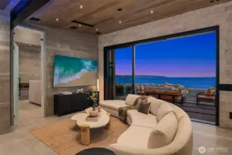 The solid obscure glass door leads to the primary suite where this view just keeps going on throughout the home.