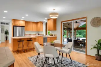 Kitchen out to the well equipped Patio and Kitchen.