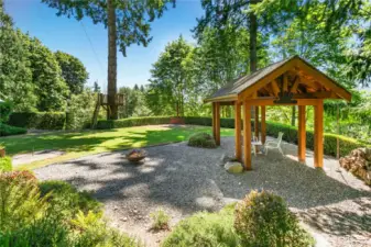 Backyard includes a lit Regulation Horseshoe Pit, Gazebo, Firepit space and Aerial Platform for the Zipline!