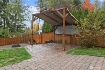 Covered patio space next to the firepit