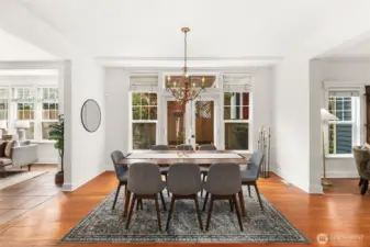 Grand dining room is perfect for large dinner parties, or step through the french doors to the brick patio for more casual, outdoor dining.