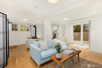 rec room has tons of windows and door to the yard.