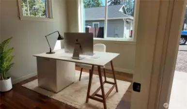 Den/Bonus room next to front door.