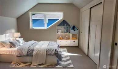 Second floor second bedroom.  AI staged.