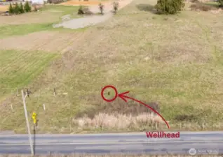 Well head at front of property to the right