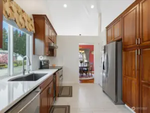 ample storage in kitchen including full cabinet height lazy susan, pull out pantry drawers, extra pantry space, soft close