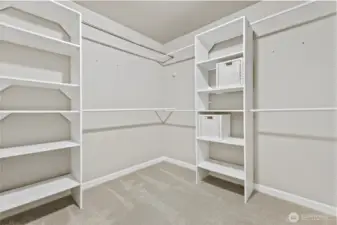 Large primary bedroom walk in closet.