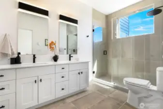 3rd full spa-like bathroom attached to primary bedroom.