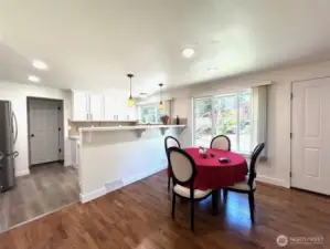dining room and kitchen. new flooring, kitchen counters, new appliances
