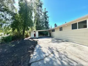backyard of home including detached storage
