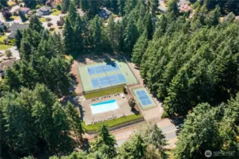 This property offers access to The Gem Club, located just across the street—an exclusive, gated amenity center featuring a pool, tennis and pickleball courts, sport courts, scenic trails, and a clubhouse.