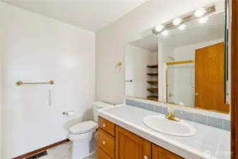 Bathroom 1 on lower level with tub-shower combination.