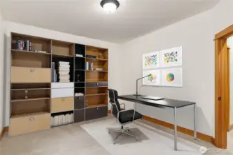 Third bedroom virtually staged as an office.
