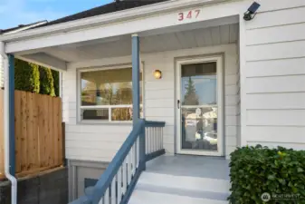 Covered Front Entry with refreshed paint and railing