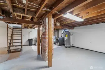 Going downstairs from the family room is the full basement. Definitely high enough ceilings for a rec room!
