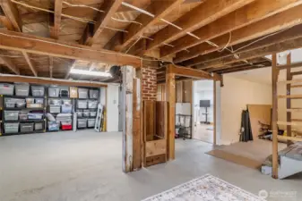 Another look at the basement. Note the door to the 4th bedroom straight ahead in the photo.